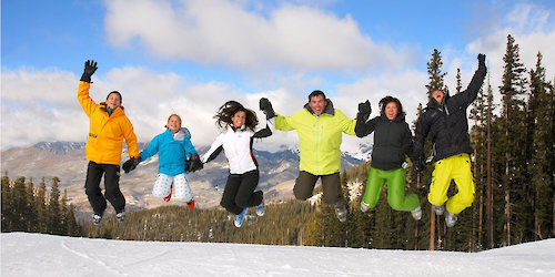 Elevation Imaging family ski vacation jumping photo